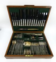 An 8 setting Dixon A1 silver plated canteen of cutlery, c1930s, in a fitted oak canteen with key.