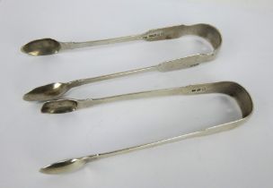 A pair of Dublin silver sugar tongs by William Cummins,1831 and a similar pair of London silver tong