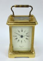 A Bornand Freres, Bicester, English brass cased 8 day carriage clock. Overall height 15cm