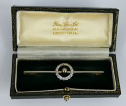 A diamond and pearl circlet bar brooch