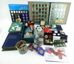 A large quantity of British, European and world coins including a 1976 US silver proof set.