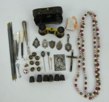 Mixed lot of silver thimbles, silver fobs, pearls, opera glasses, stick pins, needlework tools etc.