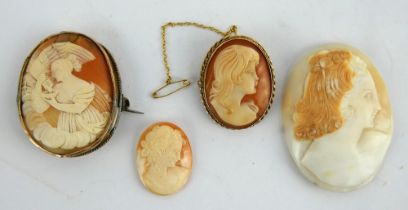 A 9ct gold mounted cameo brooch, a Georgian yellow metal mounted cameo of a woman feeding a bird