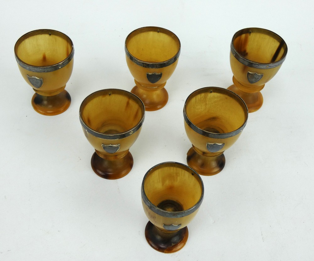Set of six silver mounted turned horn eggcups, each with silver rim and blank shield. - Image 2 of 2
