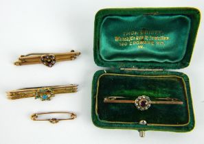 Three antique 9ct gold bar brooches and one unmarked bar brooch in fitted box. Weight 8.6 grams.