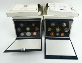 12 x British proof coin sets 1983-1994, each in slip cases with certificates