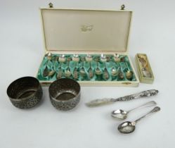 12 Swedish silver teaspoons, a silver caddy spoon, 2 English silver teaspoons, butter spreader etc