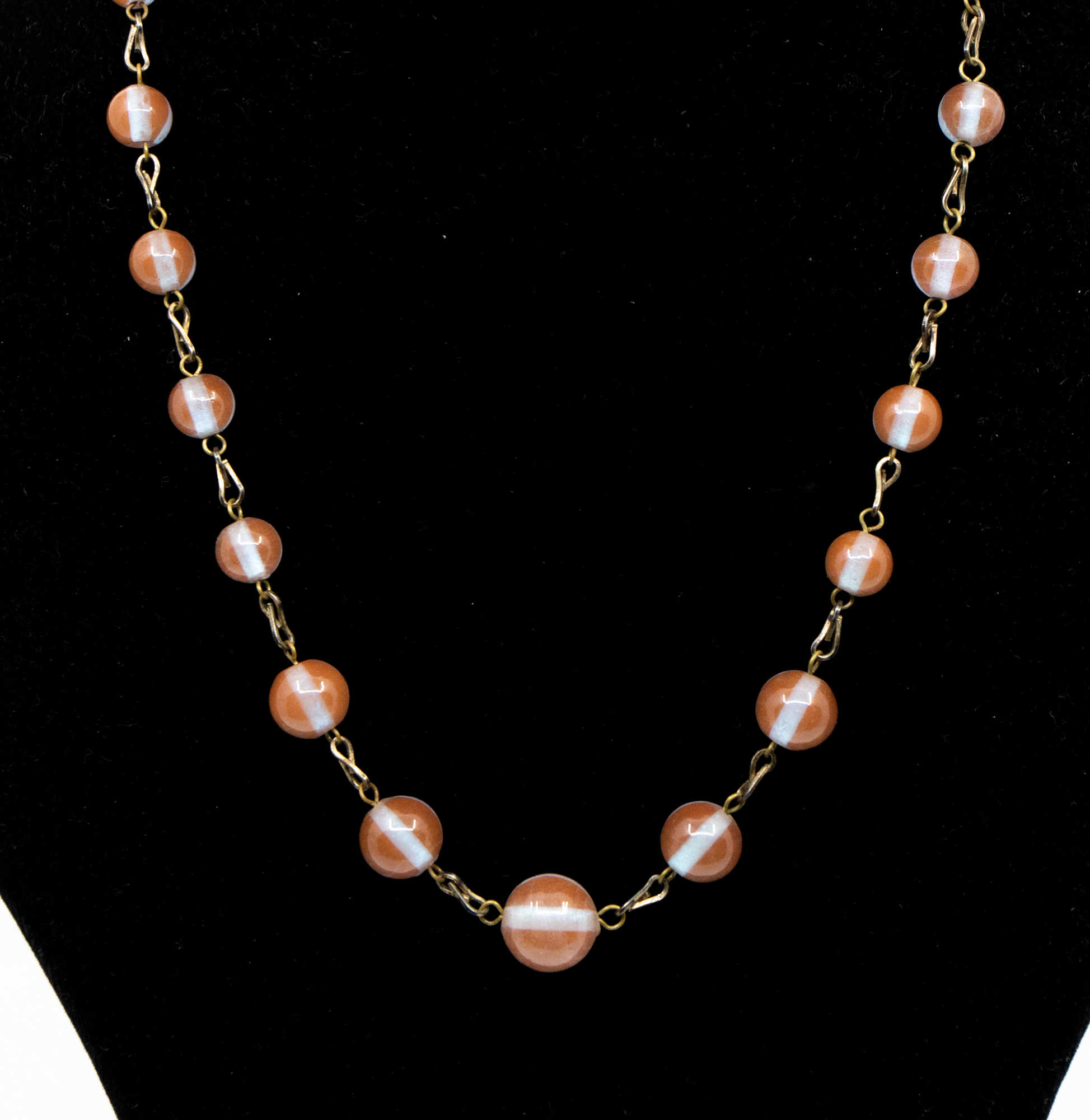 A Saphiret glass (Czech) bead necklace c.1900, comprising graduated round beads with alternate chain