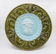 Late 19th century continental Majolica charger with gothic revival border around early 17th