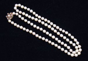 An Akoya cultured pearl necklace, comprising a single row of uniform off round pearls, measuring