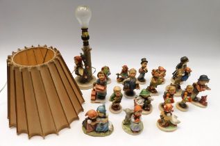 Goebel: a good collection of M.J. Hummel figurines including a lamp and shade of a little girl