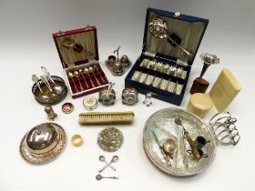 A collection of silver plated items, condiments, cased items, posy vases, flatwares, toast rack etc