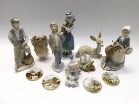 A collection of Lladro figures to include Pekinese dog, deer, rabbit, clown and female figurine,
