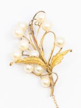 A vintage pearl set 14ct gold spray brooch, comprising cultured pearl accents, length approx 58mm,