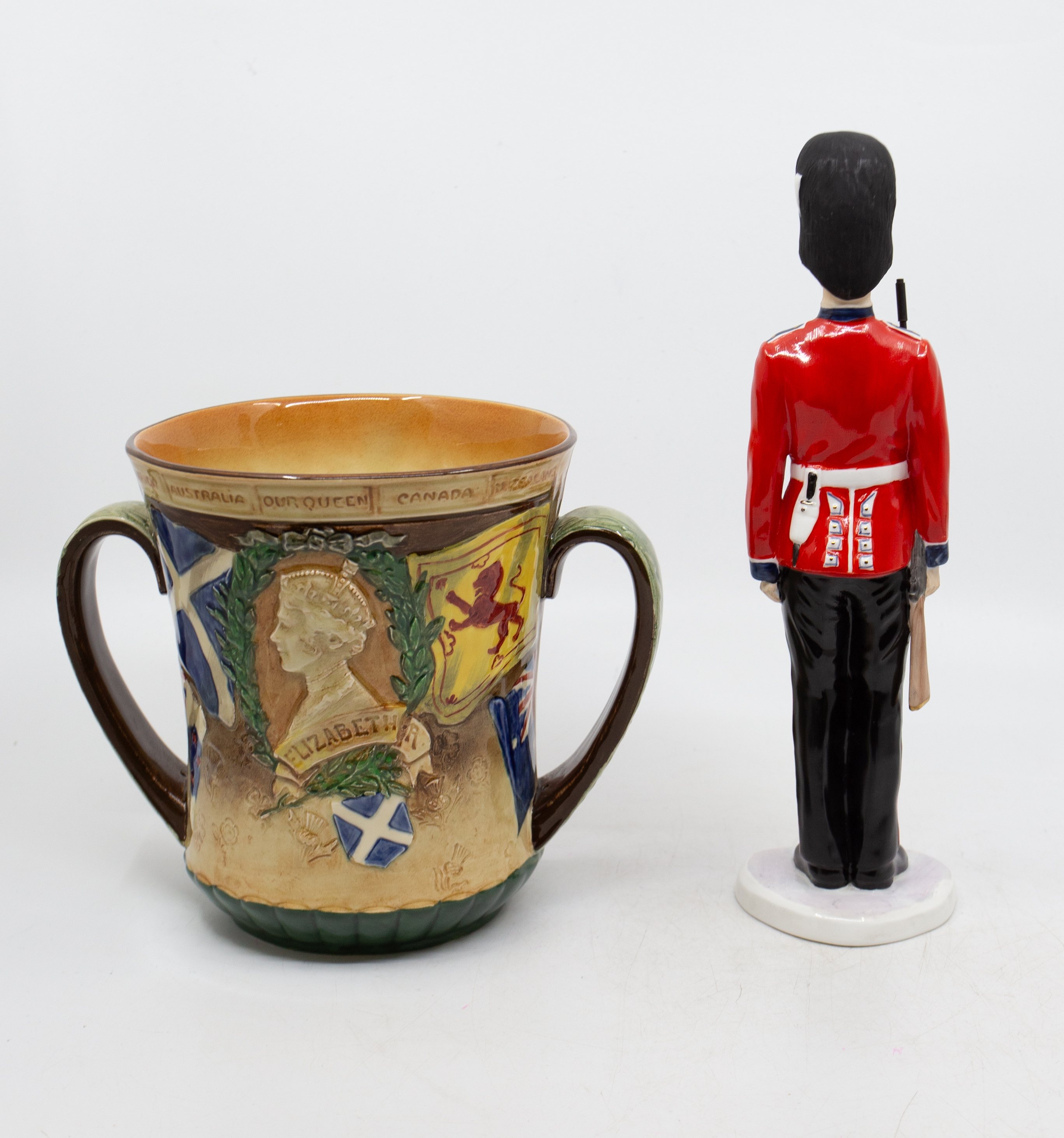 Coalport - Grenadier guard figurine and a Royal Doulton George VI Coronation loving cup - Image 2 of 3