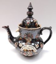 A late 19th century barge ware teapot, in good condition and with name and date detail