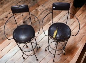 Two mid 20th century metal framed French bar stools with padded seats and back rest. Along with a