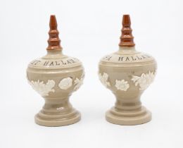 Pair of early 20th century stoneware Finial money boxes named and dated for two sisters C1909,