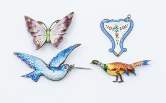 A collection of early 20th century silver and enamel brooches to include a bluebird, size approx