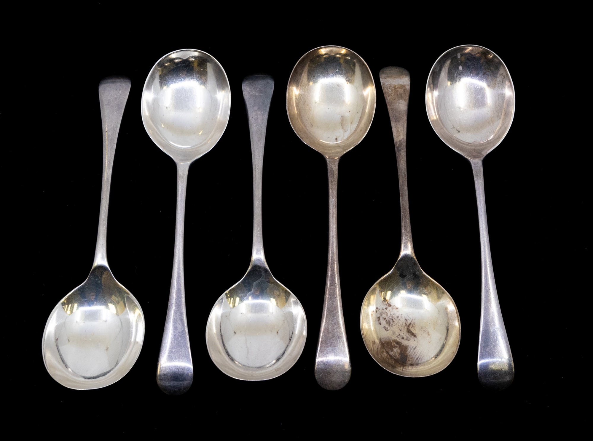 A set of six George V silver soup spoons, hallmarked by Arthur Price & Co, Birmingham, 1931. Each