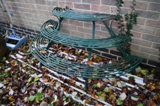 Metal half circle plant stand.