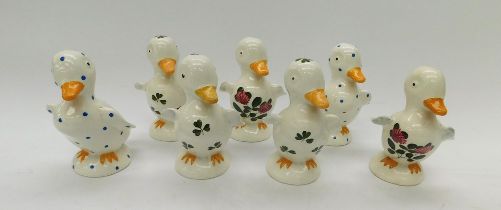 A small collection of mid 20th Century Plichta ducklings. Brightly decorated with thistles,