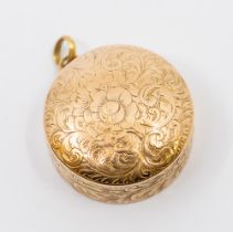 A 19th century gold vinaigrette, round form with engraved foliate decoration, inner pierced and