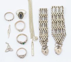 A collection of silver jewellery comprising five rings, to include three stone set, together with