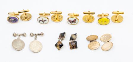 A collection of seven pairs of cufflinks to include silver, silver gilt and white metal cufflinks,