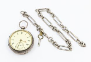 A silver cased open faced pocket watch, white enamel dia with numeral indices, case with engine