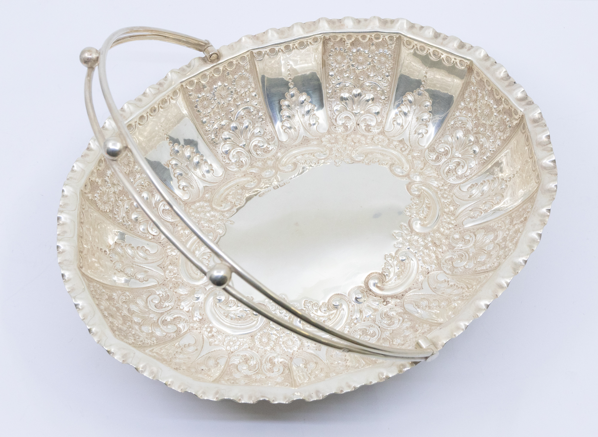 A late Victorian silver oval shaped centre basket/bowl, fluted edge with elaborate floral and - Image 3 of 3