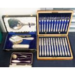 A cased George V silver dressing table set consisting of mirror, hand brush, clothes brush and comb,