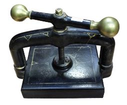 Early 20th century cast paper/book press, black with gilt detail
