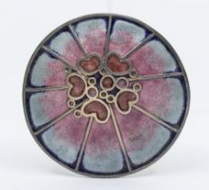 Norman Grant (Scottish 1943-2017) a silver and enamel 'Honesty' pendant/brooch of circular form,