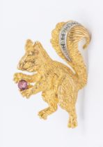 A diamond and pink sapphire set 9ct gold squirrel brooch, comprising a gold modelled squirrel