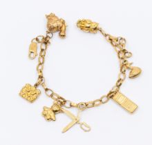 A 9ct gold charm bracelet, suspending various 9ct gold and yellow metal charms, including Owl,