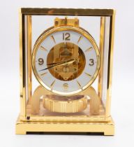 Jaeger Le Coultre 20th Century clock, Atmos, gilt brass with S glass panels and Arabic dial