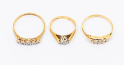 A collection of three diamond set 18ct gold rings, to include a cluster ring, size R, a five stone