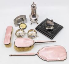 A collection of silver to include; 1) a George V silver and Art Deco pink guilloche enamelled