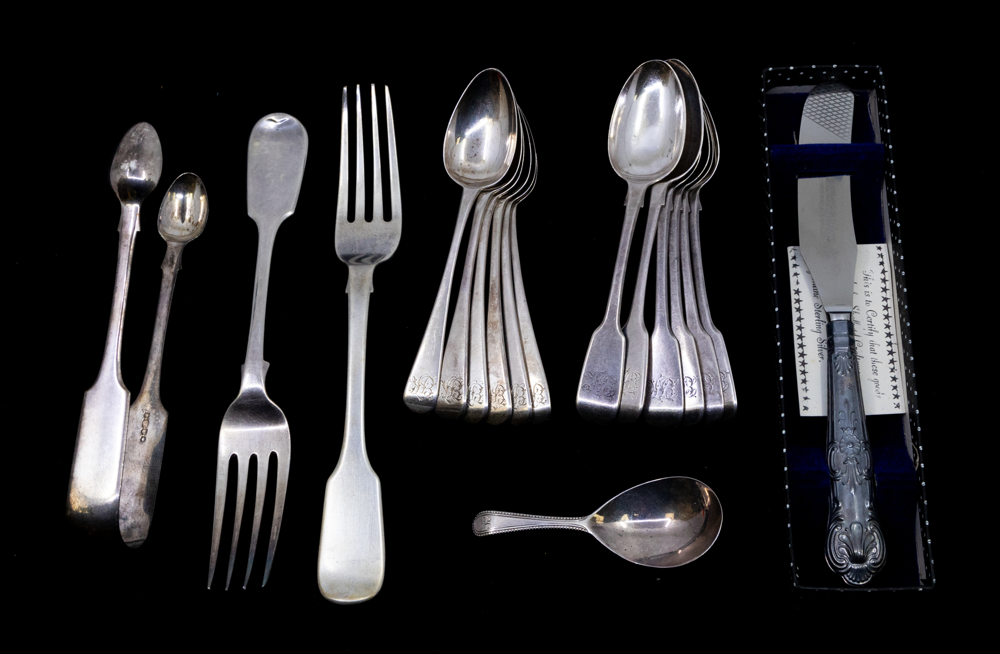 A collection of mixed silver flatware to include; a set of six William IV fiddle pattern