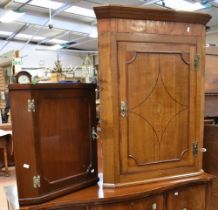 Two George III wall hanging corner cupboards.