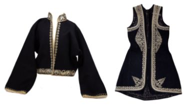 A Greek military vintage costume, to include a child's black wool jacket which is edged in a pale