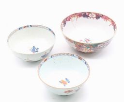 Three Chinese export ware bowls, one Famille Rose (A/F0