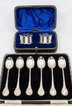 A cased set of six George VI silver tea spoons, each having commemorative Winston Churchill, Prime