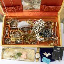 Costume jewellery: A cream jewellery box containing necklaces, watches (Accurist, Timex, Sekonda