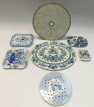 A small collection of 19th century blue and white transfer printed drainers to include; Wedgwood