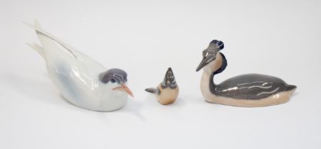 Royal Copenhagen bird figures comprising 'Tern' no 076, 'Crested Grebe' no 3263, 'Crested Tit' no