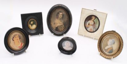A collection of 19th and early 20th century miniature portraits, hand-painted with prints