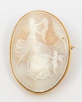 A finely carved shell cameo and 18ct gold brooch, comprising an oval form, depicting a classical