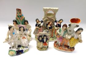 Collection of five late Victorian flat back Staffordshire figures, spill and pocket watch holder